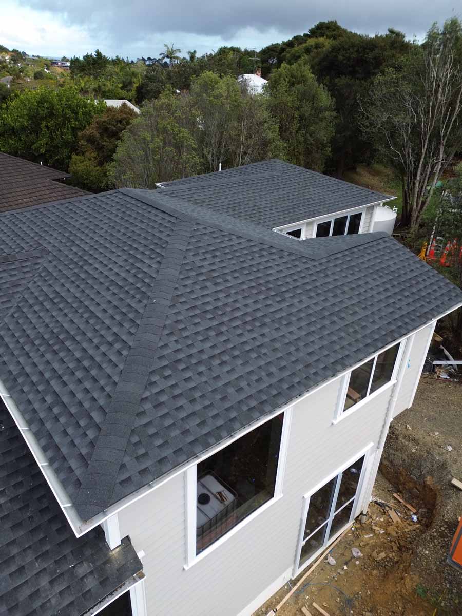 Deck Builders North Shore reviewing site plans on a Takapuna property
