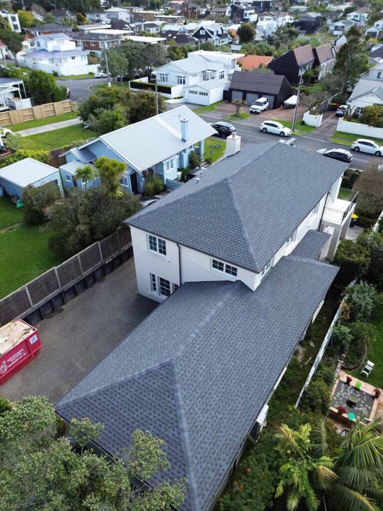 Deck Builders North Shore reviewing site plans on a Takapuna property