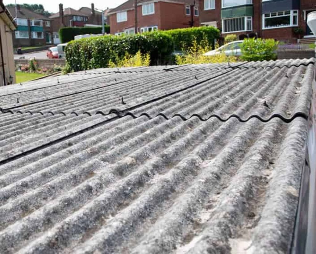 Garage with Asbestos Super Six Corrugated Roofing, a roof well over the 10 square metre unlicensed limit